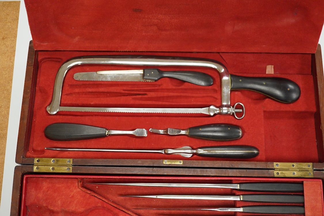 A 19th century surgeon’s set signed Mon. Charriere, Collin & Cie., Paris, in a fitted mahogany case, comprising of steel surgeons instruments; knives, scalpels, scoops, tourniquet, saws, rasps, some instruments stamped w